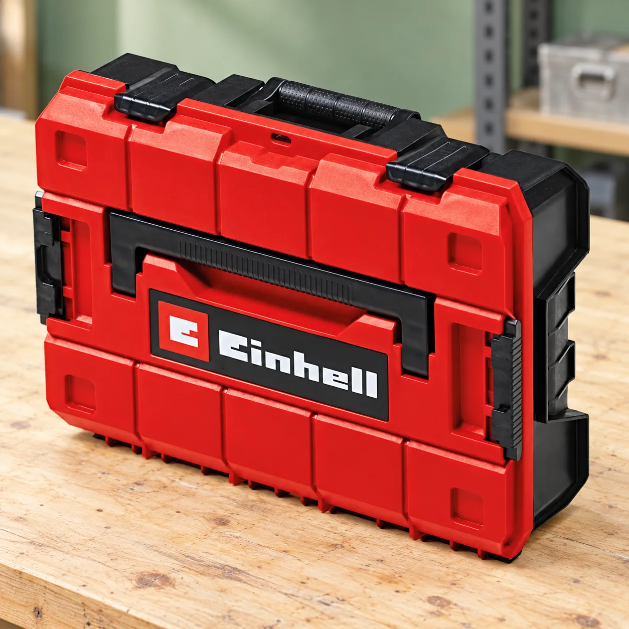 Einhell E-Case S-F — mallette empilable — illustration fidèle à la référence, dans un décor d’atelier